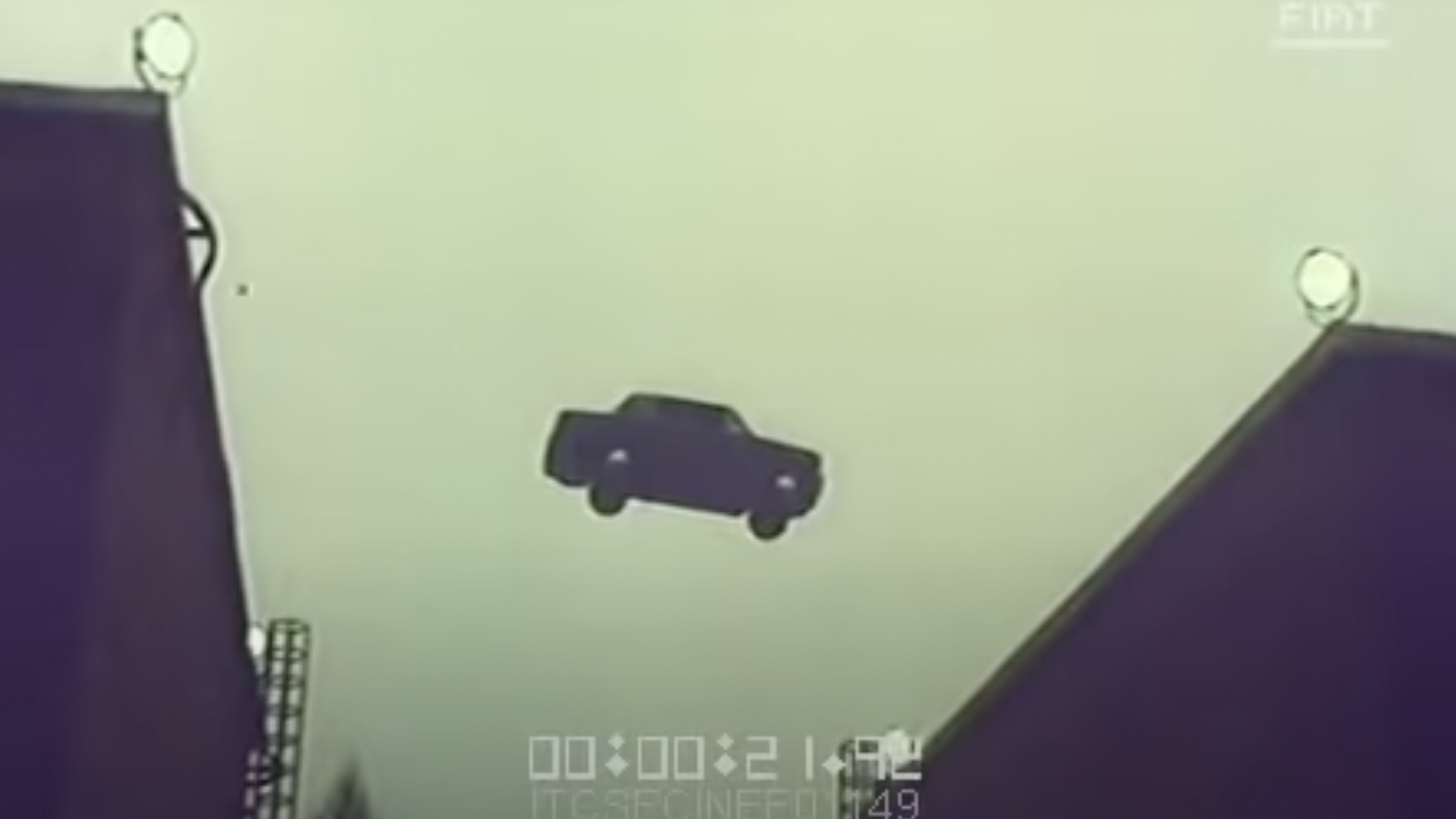 A Fiat 131 jumps between rooftops in a 1970s advert
